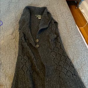 “Hand knit” sweater vest